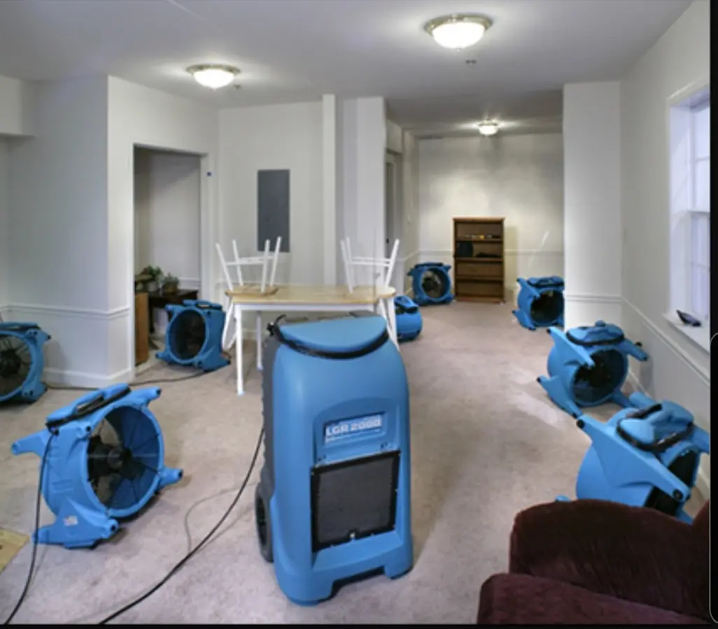 Air movers and dehumidifier setup for Water Damage Restoration in Floral Park