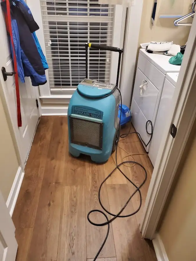 Commercial dehumidifier deployed for Flood Damage Cleanup in Floral Park